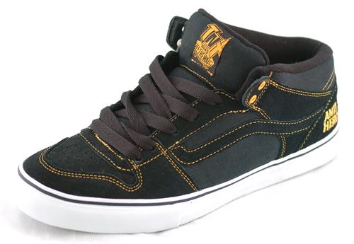 VANS TNT II MID SHOES IN ANTIHERO BLACK AND GOLD